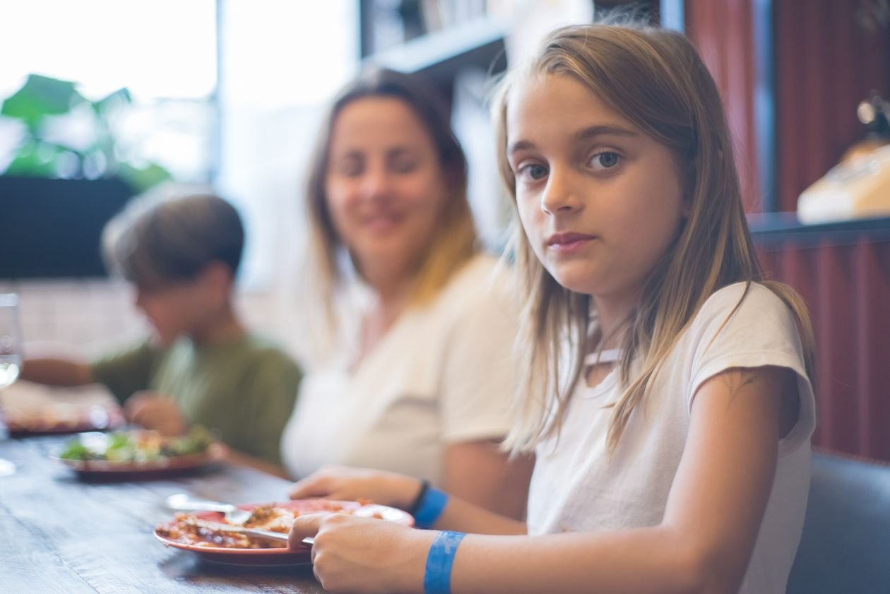 Family sharing a meal together at a dining table